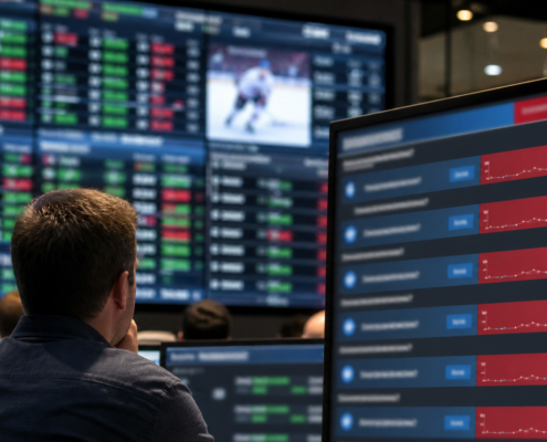 Unbranded comparison of prediction-market contracts and regulated sportsbook markets
