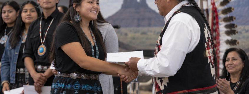 Editorial illustration of a tribal community scholarship presentation for students